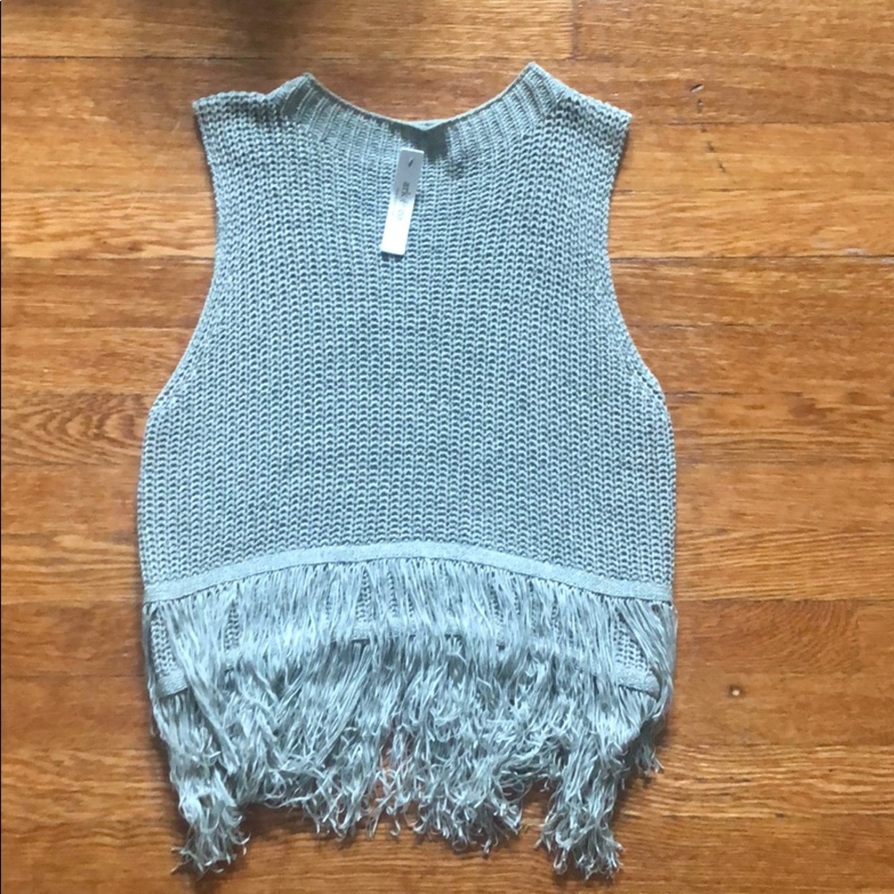 Grey sleeveless sweater with fringe